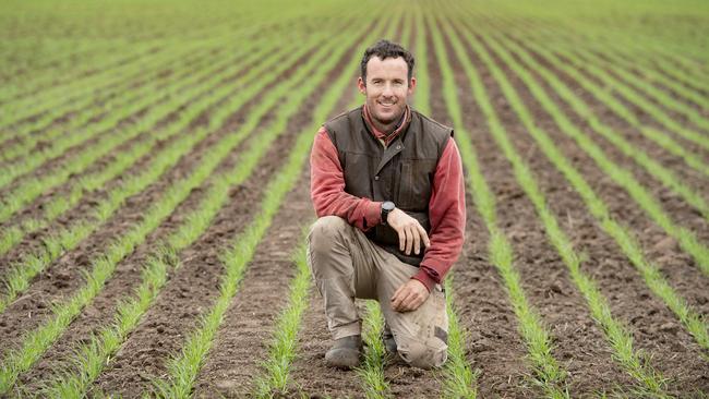 Cameron Sandral pictured in a crop of wheat at Savernake. Picture: Zoe Phillips