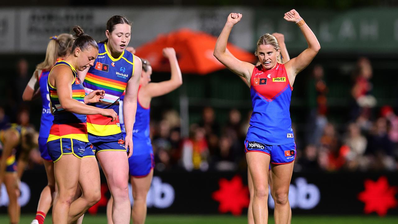 ADELAIDE, AUSTRALIA - OCTOBER 09: Lily Johnson of the Demons celebrates the win on the siren during the 2024 AFLW Round 07 match between the Adelaide Crows and the Melbourne Demons at Norwood Oval on October 09, 2024 in Adelaide, Australia. (Photo by Sarah Reed/AFL Photos via Getty Images)