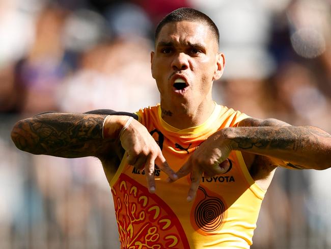 PERTH, AUSTRALIA - FEBRUARY 15: Michael Walters of the Indigenous All Stars celebrates a goal during the 2025 Toyota AFL Indigenous All Stars match between the Indigenous All Stars and the Fremantle Dockers at Optus Stadium on February 15, 2025 in Perth, Australia. (Photo by Dylan Burns/AFL Photos via Getty Images)