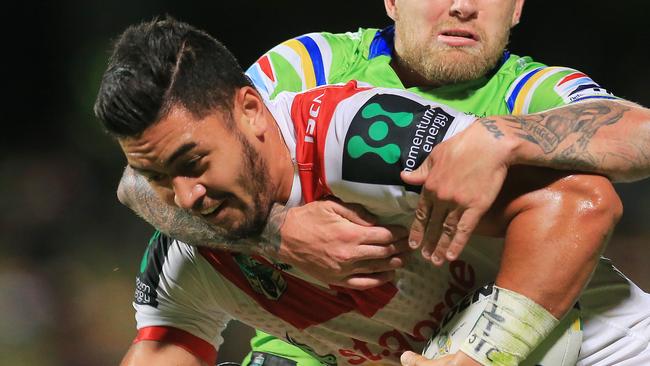 Tim Lafai of the Dragons tackled by Blake Austin of the Raiders during the St George Illawarra Dragons v Canberra Raiders NRL round 10 game at Jubilee Oval, Kogarah. Picture: Mark Evans