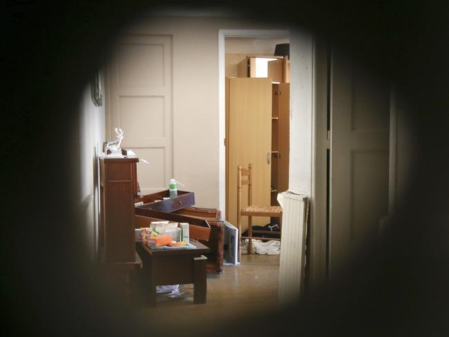 The apartment of Mohamed Lahouaiej Bouhlel is photographed through a hole in the wall made by police, in Nice, southern France. Picture: Luca Bruno