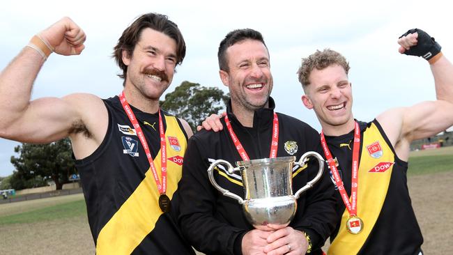 Gleeson with premiership captains Ben McNamara and James Darke. Picture: Mark Wilson