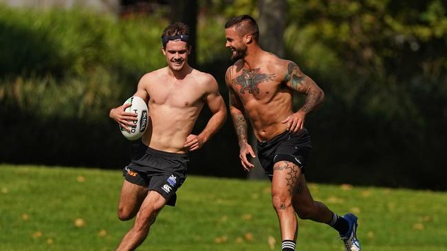 Ryan Papenhuyzen and Sandor Earl of the Melbourne Storm train in Melbourne, Tuesday, April 14, 2020. The NRL has been given "authorisation in writing" from NSW authorities for the game to restart on May 28, ARL Commission chairman Peter V'landys says. (AAP Image/Scott Barbour) NO ARCHIVING