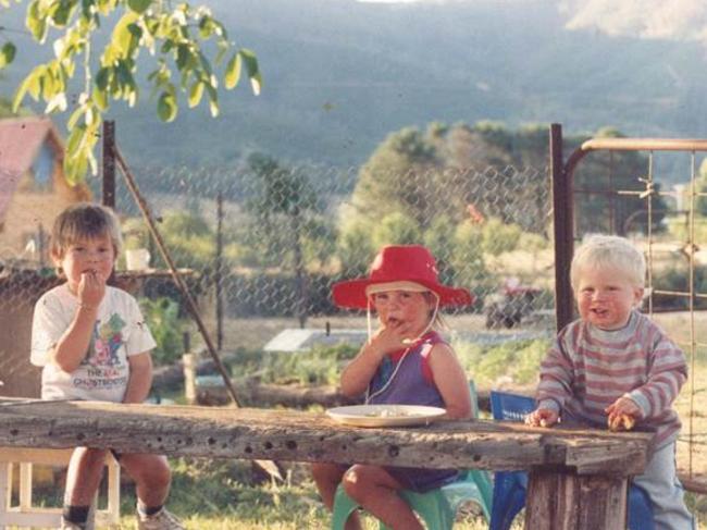 Daisy Pearce (middle) with her brothers Harry and William growing up in Bright. Picture: Supplied