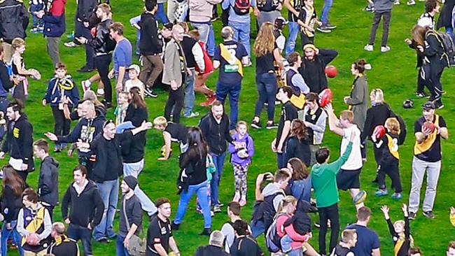 A mum injured by a footy wants a crackdown on kick-to-kick outside AFL matches. Picture: Getty Images