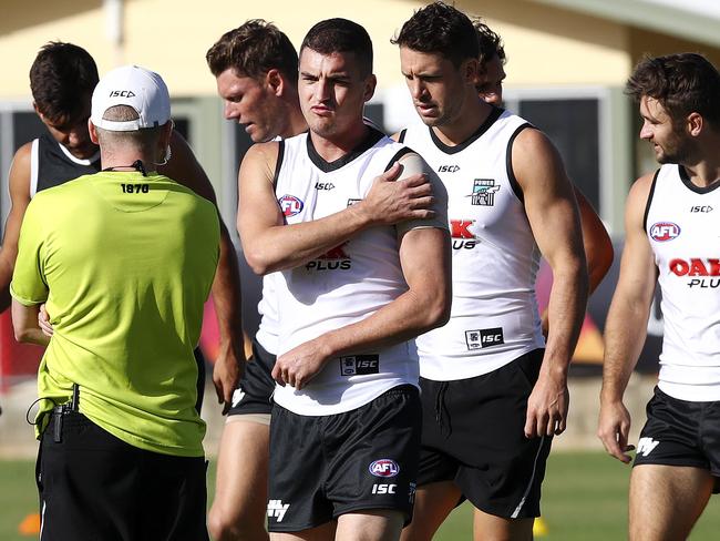 Port Adelaide’s Tom Rockliff holds his shoulder at training. Picture: SARAH REED