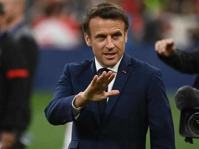 France's President Emmanuel Macron arrives to attend to the French Cup final football match between OGC Nice and FC Nantes at the Stade de France, in Saint-Denis, on the outskirts of Paris, on May 7, 2022. (Photo by FRANCK FIFE / AFP)