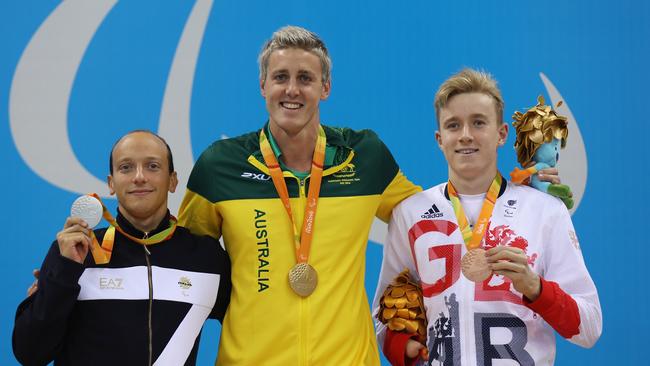 RIO DE JANEIRO, BRAZIL - SEPTEMBER 09: (L to R) Silver medalist Federico Morlacchi of Italy, Gold medalist Brenden Hall of Australia and Lewis White of Great Britain pose on the podium at the medal ceremony for the Men's 400m Freestyle - S9 on day 2 of the Rio 2016 Paralympic Games at the Olympic Aquatics Stadium on September 9, 2016 in Rio de Janeiro, Brazil. (Photo by Friedemann Vogel/Getty Images)