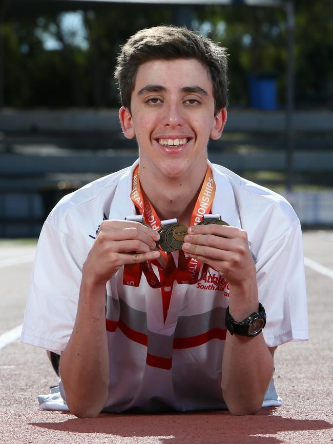 Jack Netting with his three gold medals. Picture: AAP/Emma Brasier