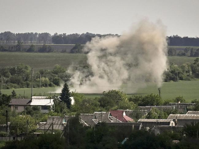 Dirt rises during shelling in the city of Soledar at the eastern Ukrainian region of Donbas on the 100th day of the Russian invasion of Ukraine. Picture: AFP