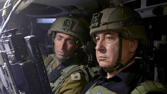 Immigration Minister Tony Burke brushed off questions on whether the government would impose sanctions on the government of Benjamin Netanyahu (right). (Photo by Israeli Prime Minister Office / AFP)