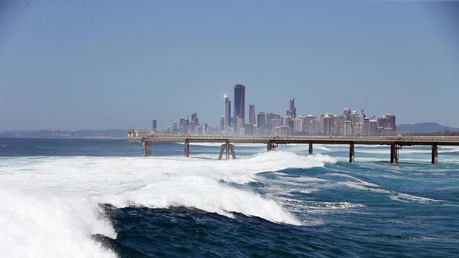 Hot weather and cyclonic swell. Picture: Richard Gosling