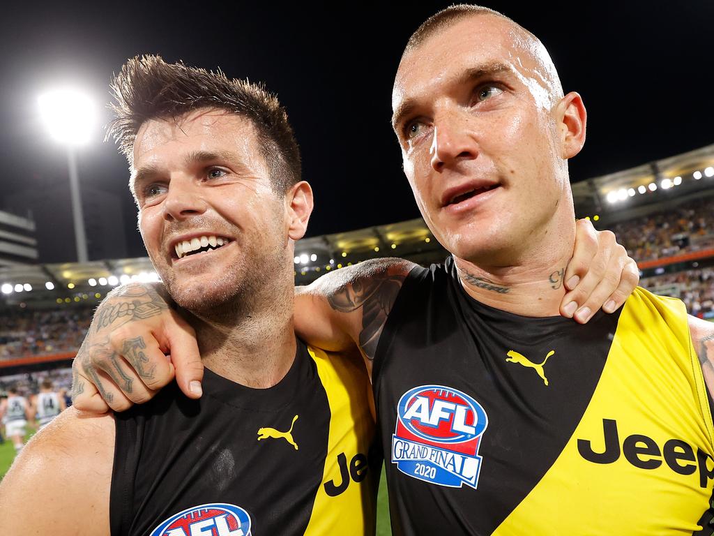 BRISBANE, AUSTRALIA - OCTOBER 24: Trent Cotchin and Dustin Martin of the Tigers (right) celebrate during the 2020 Toyota AFL Grand Final match between the Richmond Tigers and the Geelong Cats at The Gabba on October 24, 2020 in Brisbane, Australia. (Photo by Michael Willson/AFL Photos via Getty Images)