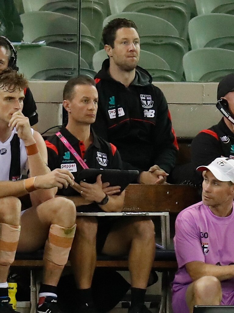 Frawley looks on from the bench after injuring himself against Carlton.