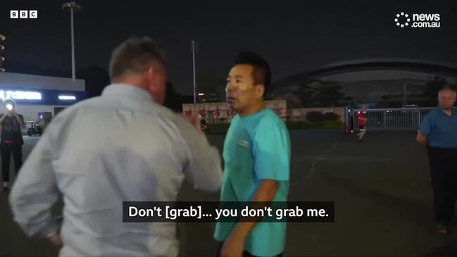 'Don't do that': Reporter accosted in China 