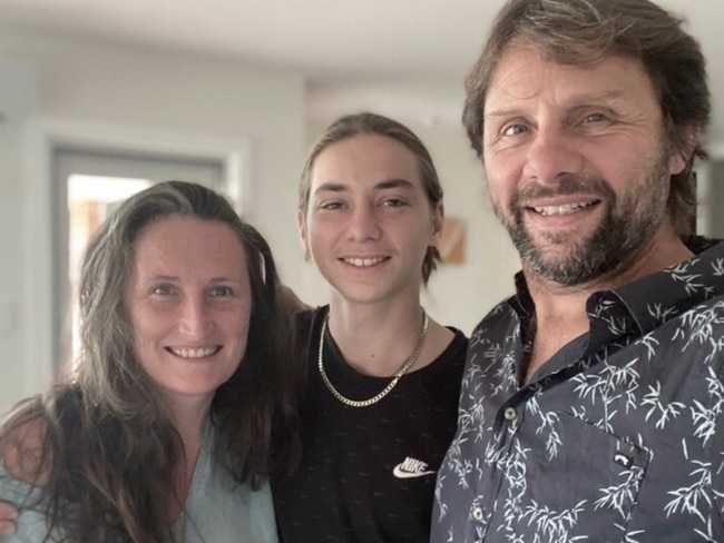 Jetson Gordon, centre, with his father John Gordon, and stepmother Emily Berry. Picture: Supplied