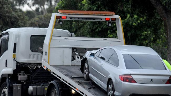 A man’s body was found with bullet wounds in a crashed car on Sunday night. Picture: Andrew Henshaw