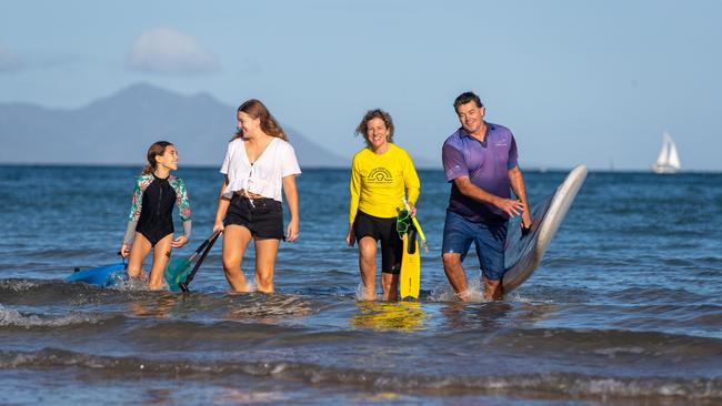 Aquascene Charters owners Adam and Stephanie Hinks with daughters Melia and Abbie at Magnetic Island. Picture: Cameron Laird