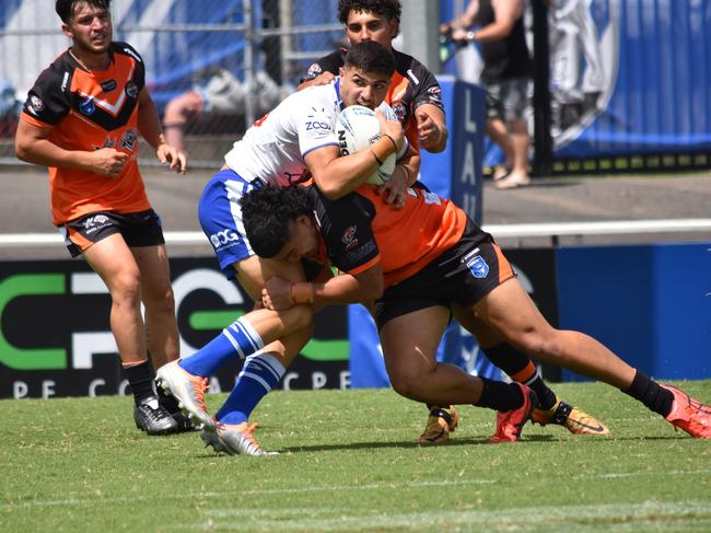 Michael Gabrael is hit by Lachlan Broederlow. Picture: Sean Teuma/NewsLocal