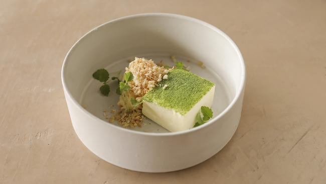 Elements of green curry; coconut &amp; lime parfait, rice puffs, lime curd. Picture: Mark Cranitch.