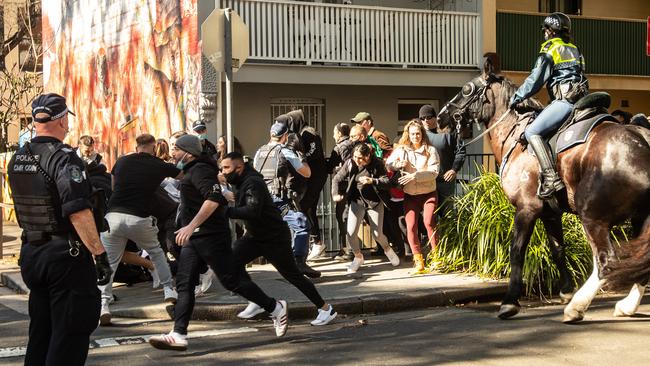 Protesters clash with police in Chippendale. Picture: Julian Andrews