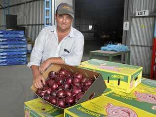 CONFIDENT: Qualipac director Troy Qualischefski with their onions. Picture: Amy Lyne