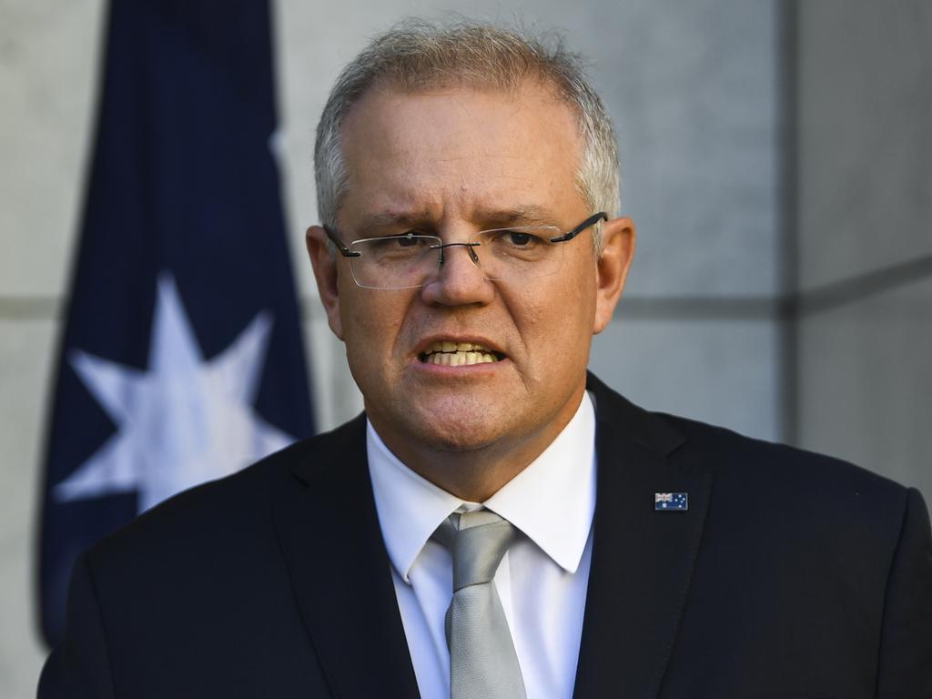 Scott Morrison issued a warning to foreign powers in the wake of this morning’s raids. Picture: Lukas Coch/AAP