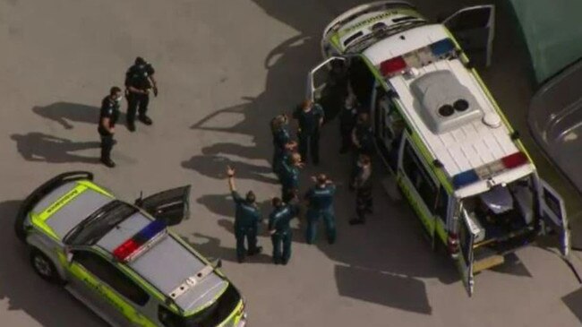 Paramedics at the Gold Coast workplace where a man was killed after he was crushed by a crane.