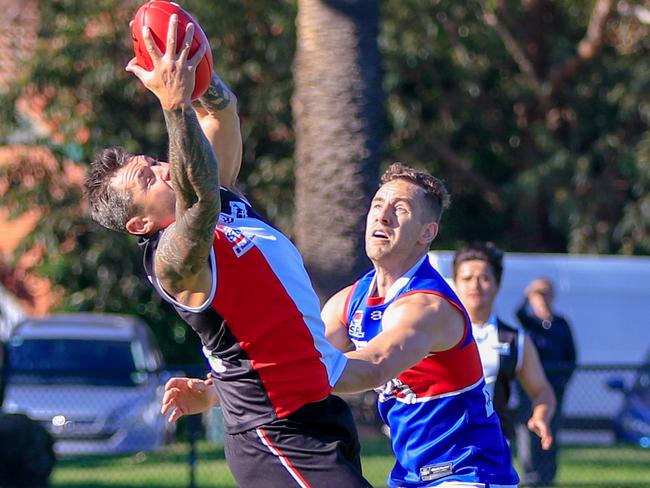 Aaron Edwards takes a strong mark for St Kilda City last month. Picture: Aaron Cook