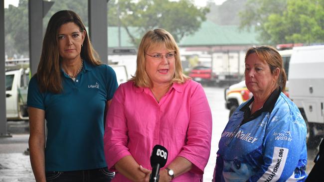 Minister for Local Government and Water and Minister for Fire, Disaster Recovery and Volunteers Ann Leahy, flanked by Local Government Association of Queensland (LGAQ) CEO Alison Smith and Hinchinbrook Shire Council Deputy Mayor Mary Brown, who is also president of the Hinchinbrook Chamber of Commerce. The trio were speaking outside the council headquarters in flood-ravaged Ingham on Tuesday. Picture: Cameron Bates