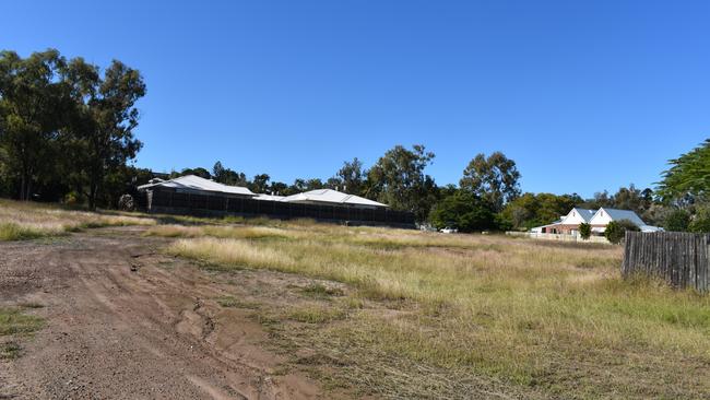 The vacant land where the units will be built.