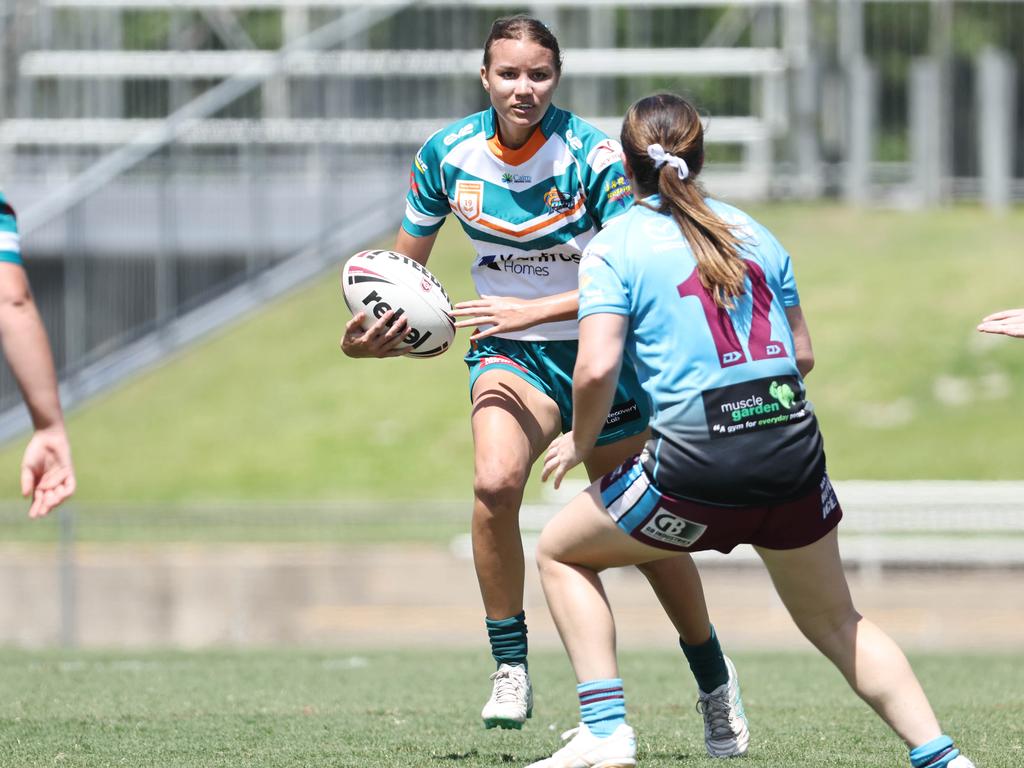 Jordana Woods attacks the line in the Queensland Rugby League (QRL) Under 19 Women's match between the Northern Pride and the Mackay Cutters, held at Barlow Park. Picture: Brendan Radke