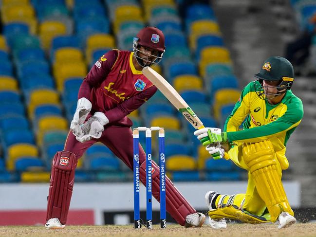 Alex Carey (R) is tipped to be Tim Paine’s replacement in the Test team. Picture: Randy Brooks / AFP