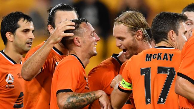 Brisbane Roar winger Eric Bautheac (centre) celebrates scoring against Wellington on Friday night. Picture: AAP 