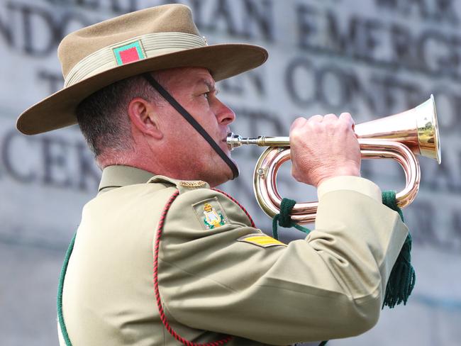 A buglar playing the last post. Remembrance Day at the Hobart Cenotaph. Picture: NIKKI DAVIS-JONES