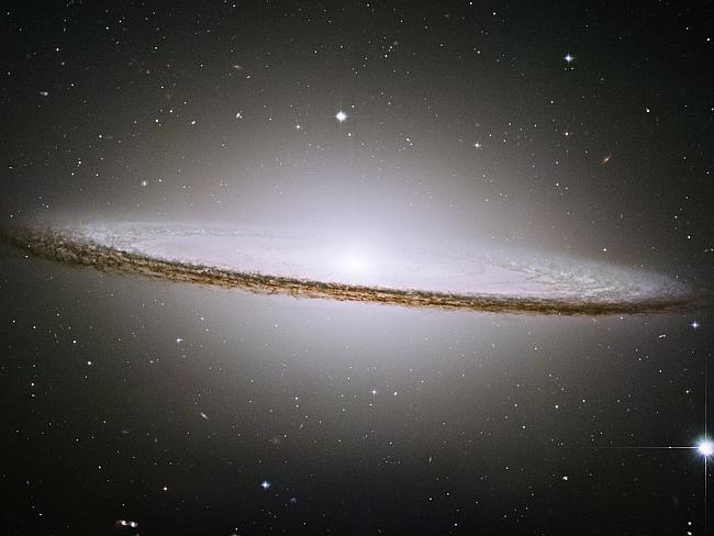 Hubble Space Telescope has trained its razor-sharp eye on one of the universe's most stately and photogenic galaxies, the Sombrero galaxy, Messier 104 (M104).