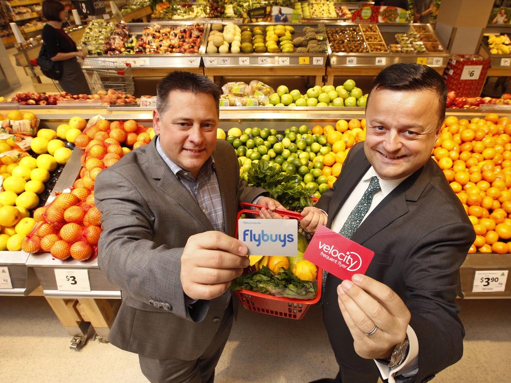 General Manager Flybuys Adam Story and CEO Velocity Frequent Flyer Karl Schuster linking up at Coles Glen Iris. Picture: David Caird