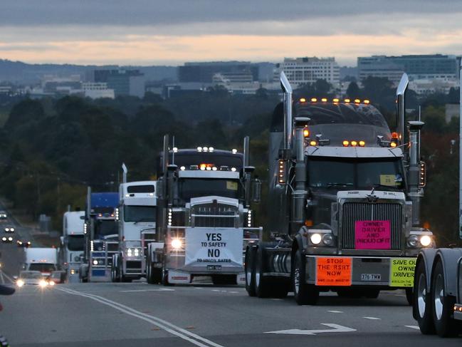 Australian Trucking Association (ATA) holding a truck convoy and rally on the lawns of Parliament House calling for the abolition of the Road Safety Remuneration Tribunal, at Parliament House in Canberra. Picture Kym Smith