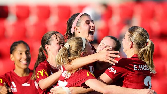 ADELAIDE, AUSTRALIA - MAY 04: Erin Healy of Adelaide United scores the equaliser  celebrating with team mates during the First Leg of the A-League Women's Semi Final between Adelaide United and Melbourne Victory at Coopers Stadium, on May 04, 2025, in Adelaide, Australia. (Photo by Sarah Reed/Getty Images)