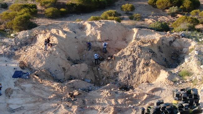 Police digging for evidence at the site. Picture: Nine News