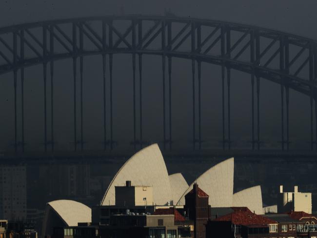 The Sydney Harbour Bridge and Opera House shrouded in a layer of fog earlier this week. Picture: NCA NewsWire / Jenny Evans