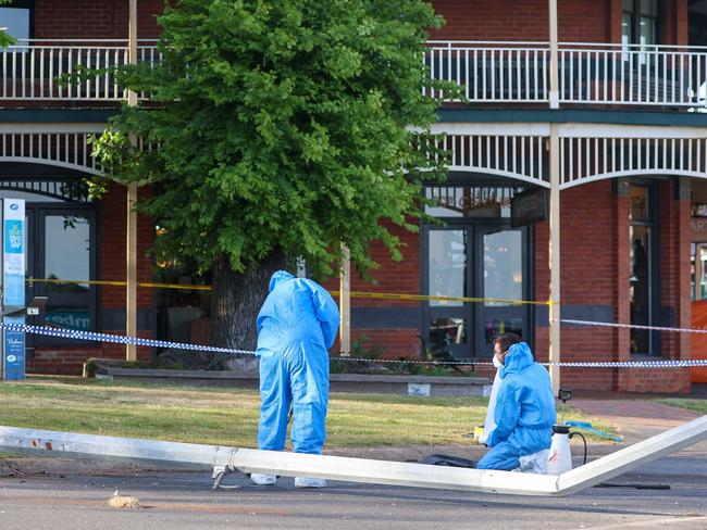 Investigators at the Royal Daylesford Hotel after the crash. Picture: Brandan Beckett