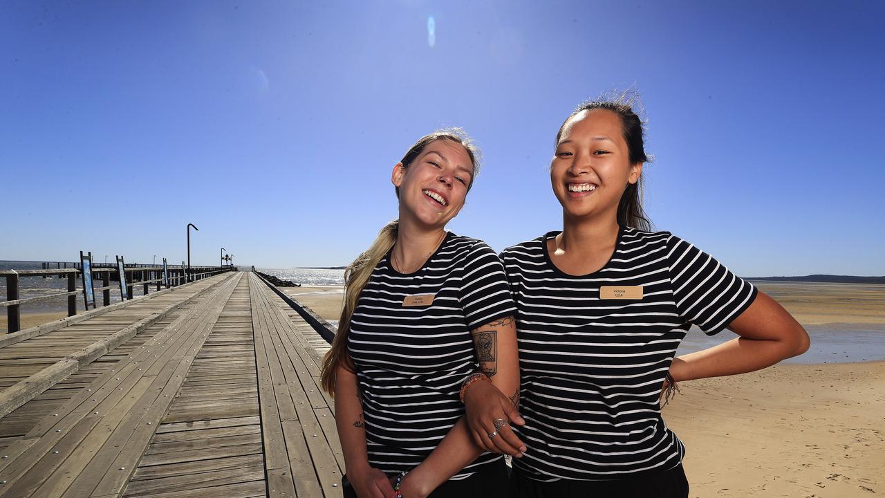 Kelsey Kurre and Victoria Kelley from Ohio in the USA are enjoying a working holiday Down Under with a stint on Fraser Island. Picture: Adam Head