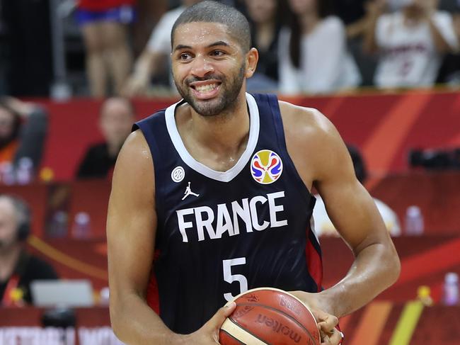 France’s Nicholas Batum celebrates after the win. Picture: Getty Images