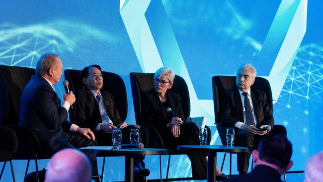 Andrew Forrest moderates a conference panel including International Energy Agency boss Fatih Birol. Photo by Oscar Colman