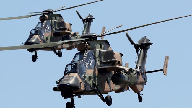 Two Army ARH Tiger helicopters take part in t he Australian Defence Force flying demonstration during the lead up to the 2019 Avalon Airshow in Victoria. Stuart McEvoy/The Australian.