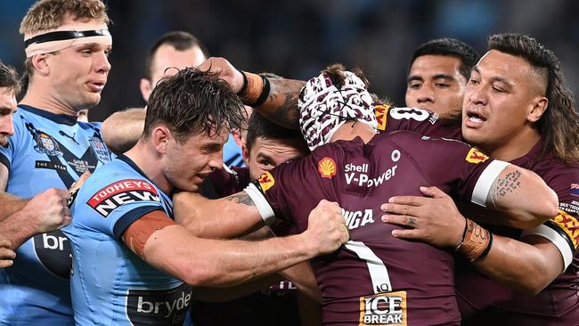 Cameron Murray in a scuffle with Kalyn Ponga (Photo by Bradley Kanaris/Getty Images)