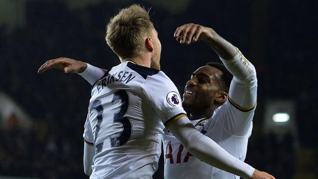 Tottenham Hotspur's Danish midfielder Christian Eriksen (L) celebrates scoring.