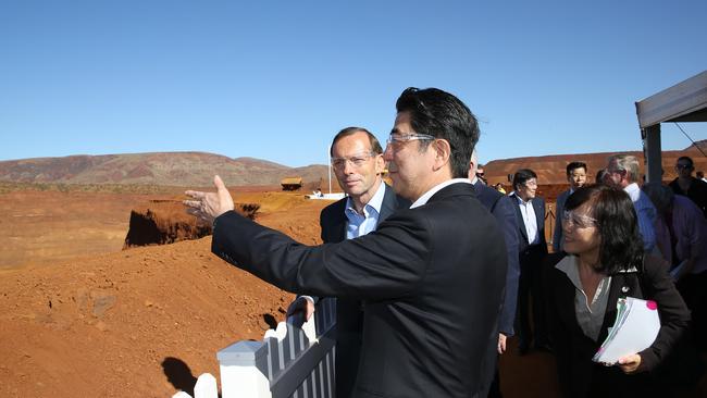 Looking at the mine ... Prime Minister Tony Abbott and the Japanese Prime Minister Shinzo Abe at Rio Tinto’s West Angelas iron ore mine in the Pilbara, Western Australia. Picture: Gary Ramage