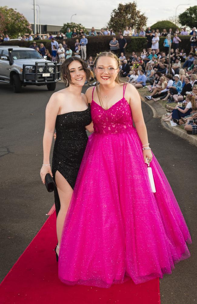 Kyra Ford (left) and Eleana Escober at Harristown State High School formal at Highfields Cultural Centre, Friday, November 17, 2023. Picture: Kevin Farmer